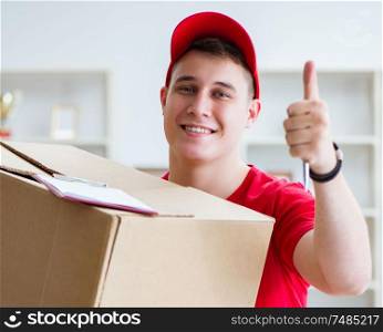 The post man delivering a parcel package. Post man delivering a parcel package