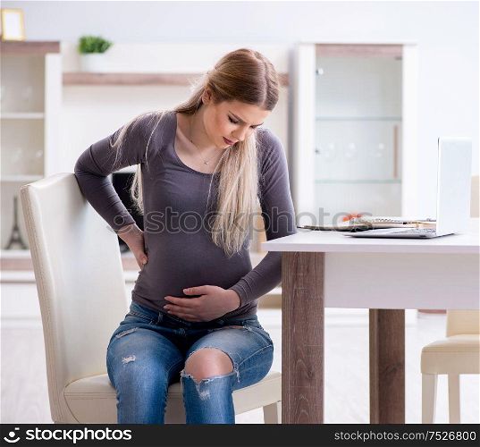 The pregnant woman at home getting ready for childbirth. Pregnant woman at home getting ready for childbirth