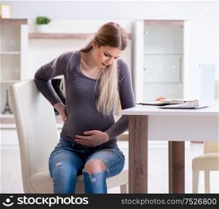 The pregnant woman at home getting ready for childbirth. Pregnant woman at home getting ready for childbirth