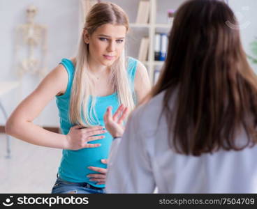 The pregnant woman at regular pregnancy check-up. Pregnant woman at regular pregnancy check-up