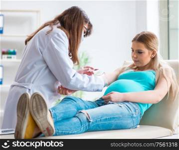 The pregnant woman at regular pregnancy check-up. Pregnant woman at regular pregnancy check-up