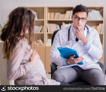 The pregnant woman visiting doctor for consultation. Pregnant woman visiting doctor for consultation