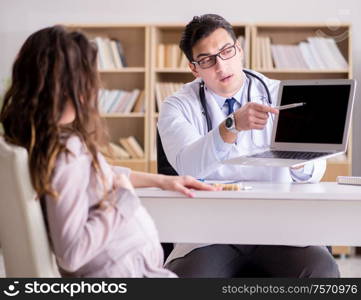 The pregnant woman visiting doctor for consultation. Pregnant woman visiting doctor for consultation