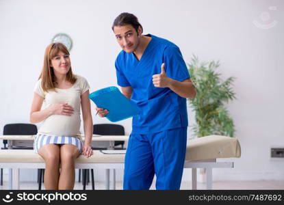 The pregnant woman visiting male doctor gynecologist. Pregnant woman visiting male doctor gynecologist