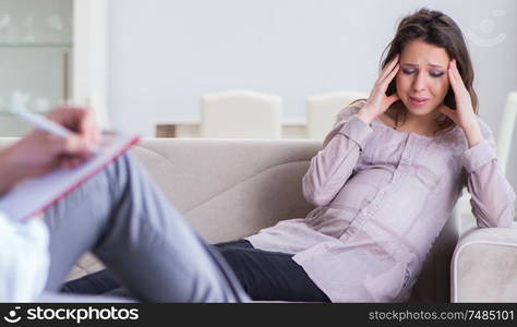 The pregnant woman visiting psychologist doctor. Pregnant woman visiting psychologist doctor