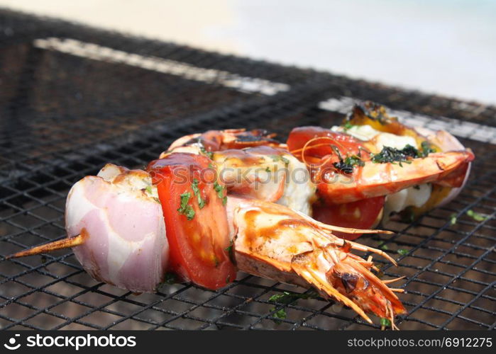 The prepared shrimps. The food cooked at restaurant. Various dishes for every taste and choice.