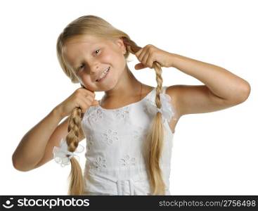 The pretty girl the blonde holding itself for braid. It is isolated on a white background