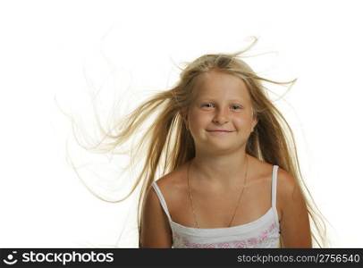 The pretty girl the blonde with flying hair. It is isolated on a white background