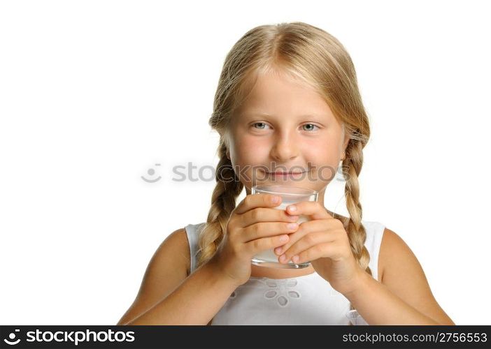 The pretty girl with a glass of milk. It is isolated on a white background
