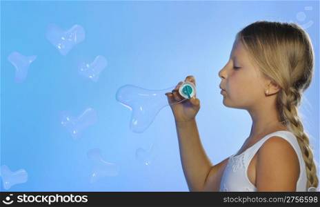 The pretty girl with bubbles heart. A blue background