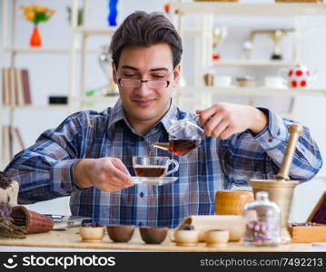 The professional tea expert trying new brews. Professional tea expert trying new brews