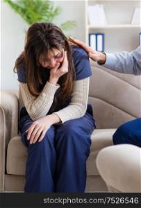 The psychologist counselling woman beaten by husband. Psychologist counselling woman beaten by husband