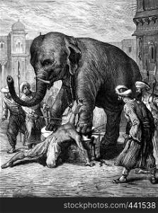The punishment of a traitor. The elephant crushes his head with a single blow, vintage engraved illustration. Journal des Voyage, Travel Journal, (1880-81).