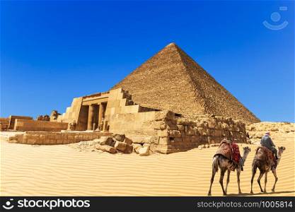 The Pyramid of Cheops and the Mastaba of Seshemnefer IV, Giza, Egypt.. The Pyramid of Cheops and the Mastaba of Seshemnefer IV, Giza, Egypt