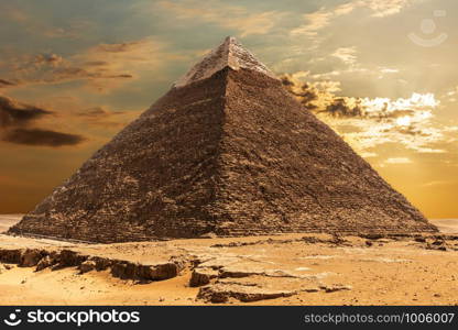 The Pyramid of Khafre at sunrise in Giza, Egypt.. The Pyramid of Khafre at sunrise, Giza, Egypt