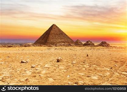 The Pyramid or Menkaure and the Pyramids of the queens at sunset, Giza, Egypt.
