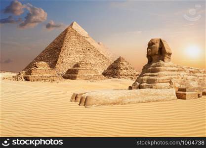 The Pyramids and the Sphinx of Giza, famous world landmark scenery.. The Pyramids and the Sphinx of Giza, famous world landmark scenery