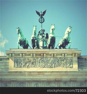 The Quadriga on the Brandenburg gate in Berlin, Germany. Retro style filtred image