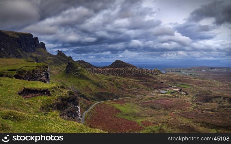 The Quiraing: rain and wind to october evening. Northeast coast of Trotternish Peninsula, Isle of Skye, Inner Hebrides, Scotland, United Kingdom, Europe.