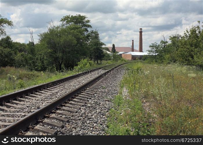 The railroad is in the industrial zone