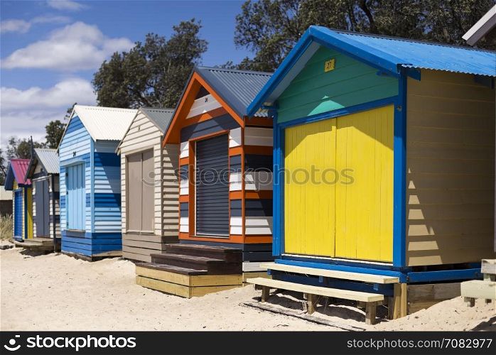 The rainbow coloured bathing boxes are a symbol of summer and a tourist attraction of the Mornington Peninsula, south of Melbourne, Australia