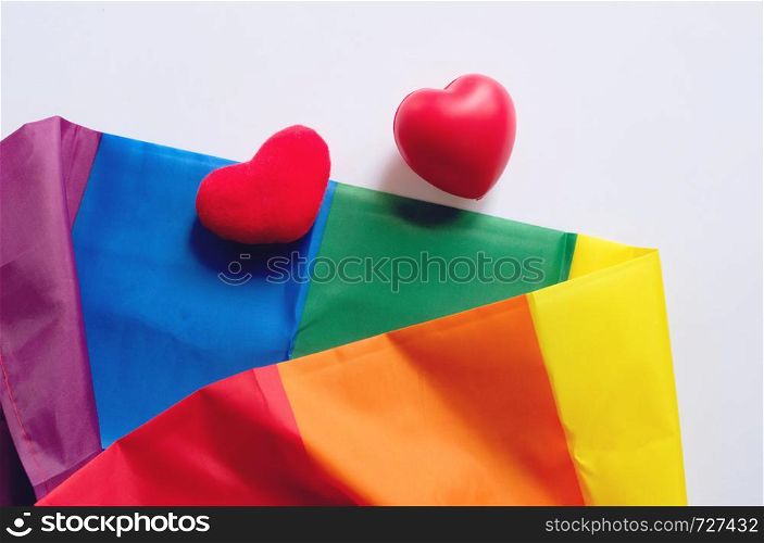 The rainbow flag is a symbol of pride lgbt and lgbtq with heart shape on white background, love wins concept
