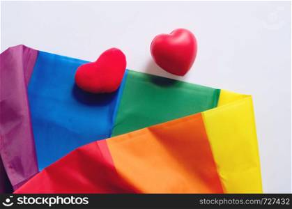 The rainbow flag is a symbol of pride lgbt and lgbtq with heart shape on white background, love wins concept