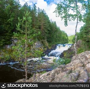 The rapid Kivach waterfall on a summer day, Karelia, Russia.