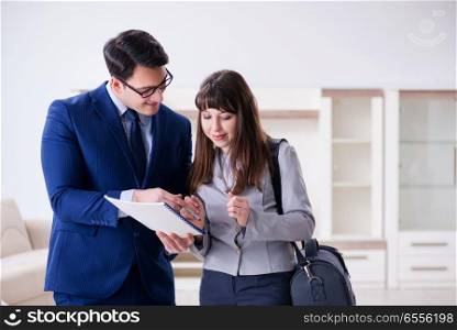 The real estate agent showing new apartment to owner. Real estate agent showing new apartment to owner