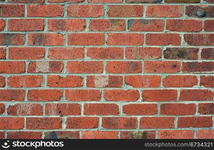 The red brick wall for design backgrounds