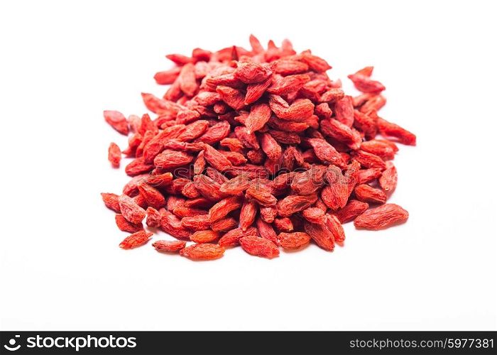 The red dried goji berries isolated on white. The Goji berries isolated