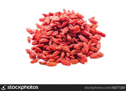 The red dried goji berries isolated on white. The Goji berries isolated