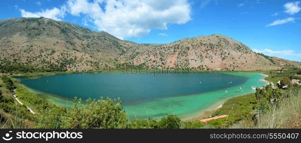 The remarkable emerald-green Lake Kournas on Crete, Greece, which is the island&rsquo;s only permanent, natural fresh-water lake, being fed by springs from the Lefki Ora (White Mountains) beyond.