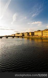 The River Arno looking towards a bridge, Florence, Italy, evening