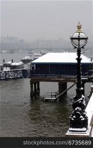 The River Thames, London, England, on a cold, snowy, Winter&rsquo;s Day