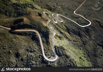 The road and Landscape allrond the Volcano Piton de la Fournaise on the Island of La Reunion in the Indian Ocean in Africa.