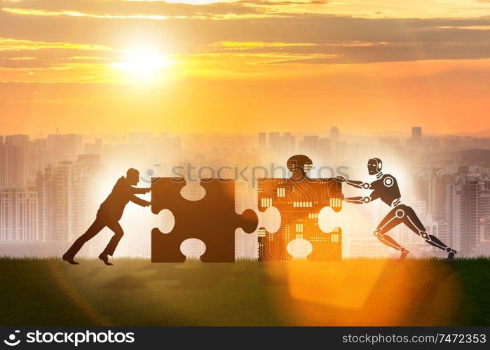 The robot and human cooperating in jigsaw puzzle. Robot and human cooperating in jigsaw puzzle