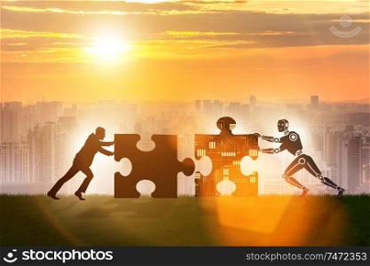 The robot and human cooperating in jigsaw puzzle. Robot and human cooperating in jigsaw puzzle
