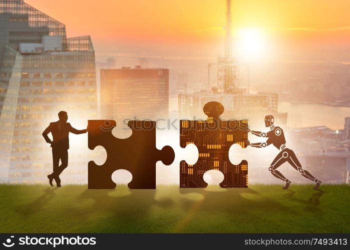 The robot and human cooperating in jigsaw puzzle. Robot and human cooperating in jigsaw puzzle