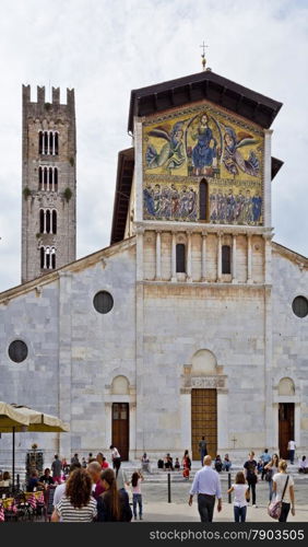 The Romanesque Basilica of San Frediano in Lucca, Tuscany, Italy, with the monumental golden mosaic on the facade