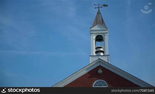 The roof steeple of the fire station