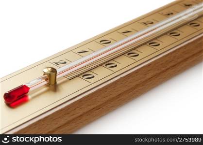 The room thermometer closeup. It is isolated on a white background