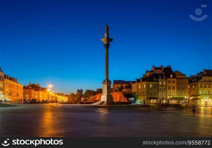 The Royal Castle square and King Sigismunds Column in Warsaw city at night, Poland. The Royal Castle square