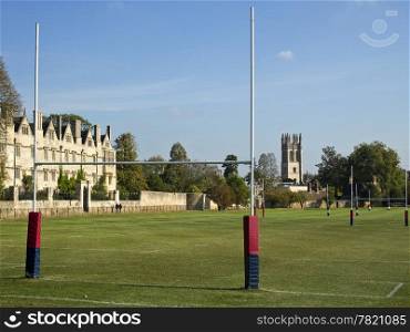 The rugby fields of Christ Church green with Merton College of Oxford University in the background.