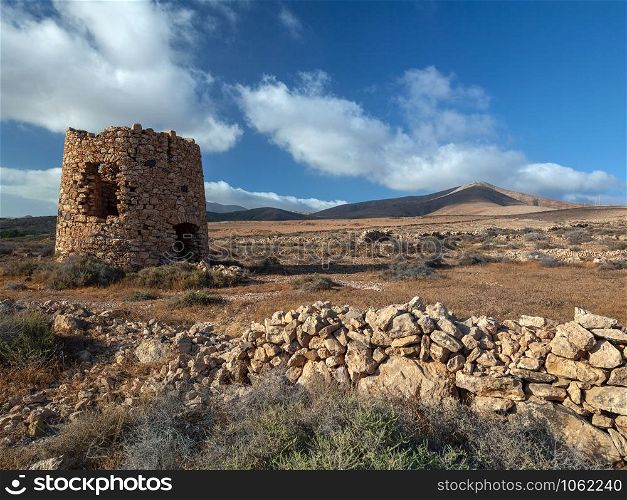 The ruin of an old windmill on the island of Fuerteventura in the Spanish Canary Islands in the North Atlantic.