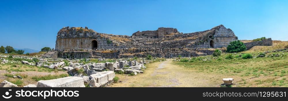 The ruins of an Ancient Theatre in the greek city of Miletus in Turkey on a sunny summer day. Miletus Ancient Theatre in Turkey