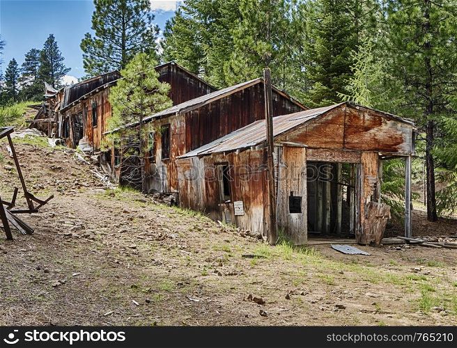 The ruins of the old Blue Ridge Mine in the Ochoco Mountains of Central Oregon stretch down a hill so that gravity can help the ore processing equipment.