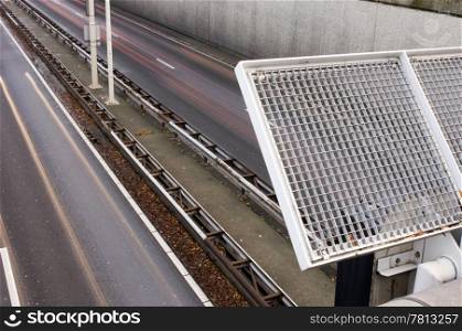 The safety fence on an overpass over a motorway