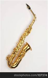 The saxophone (also referred to as the sax) is a conical-bored transposing musical instrument that is a member of the woodwind family. Saxophones are usually made of brass and played with a single-reed mouthpiece similar to that of the clarinet.