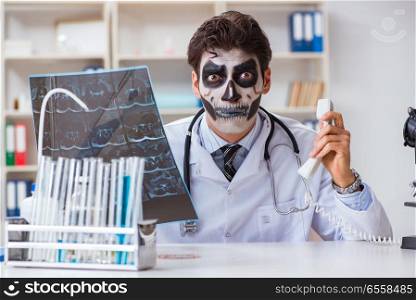 The scary monster doctor working in lab. Scary monster doctor working in lab